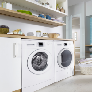 a white side by side dryer and washing machine set